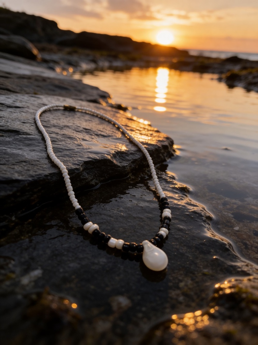 Black and White Beaded Necklace with Tear Drop Pendant